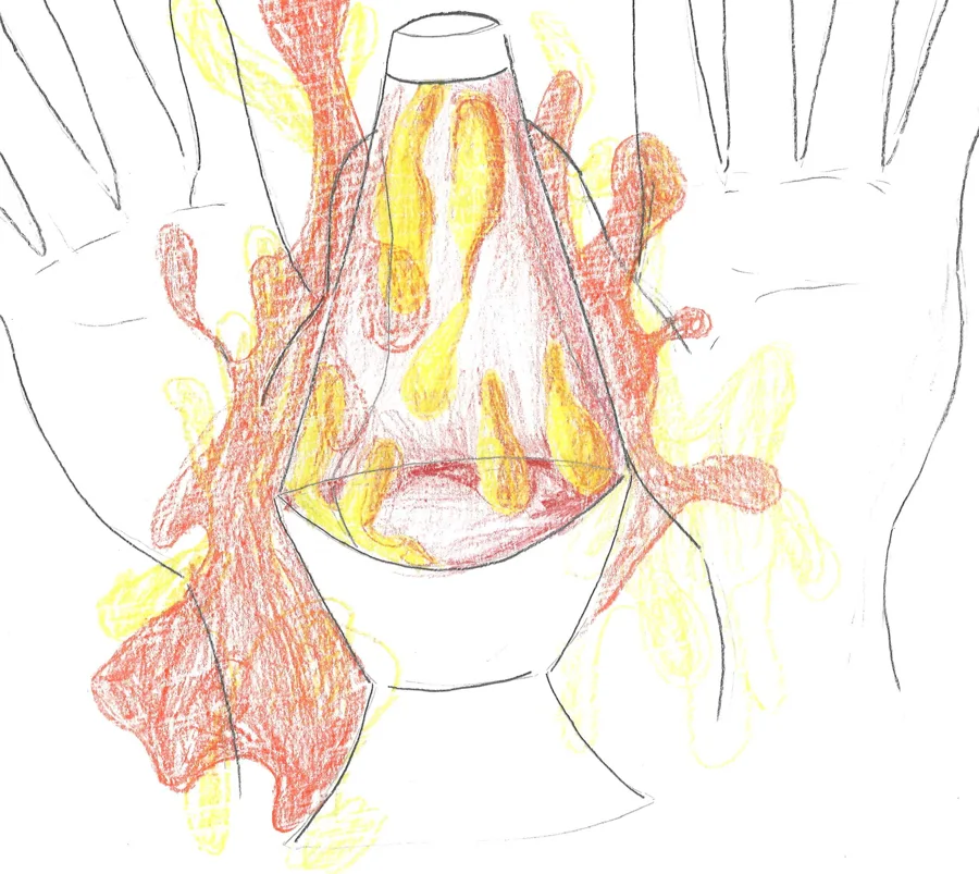A lava lamp held between two hands