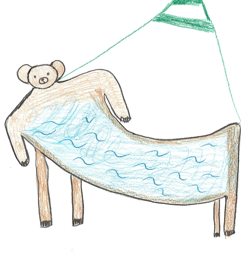 A bear stretched over a bed of water